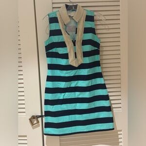 Sail to Sable navy/teal dress. Gold thread shimmery at neck/chest. Small